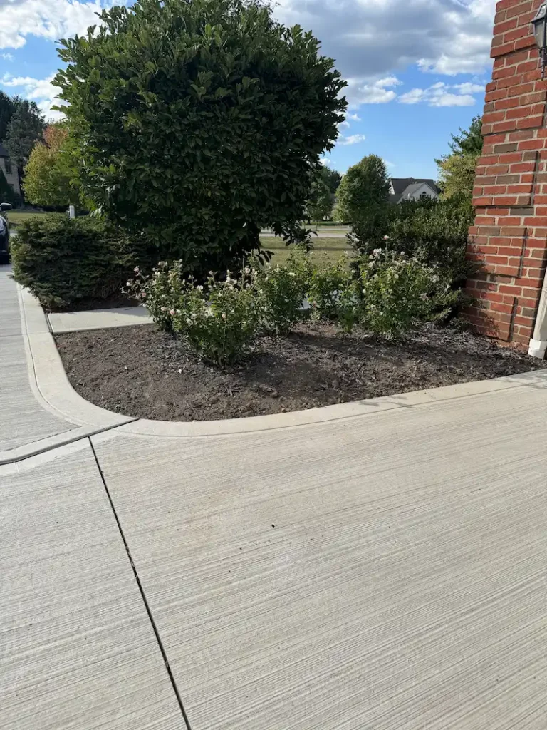 Beautiful curved concrete driveway installation