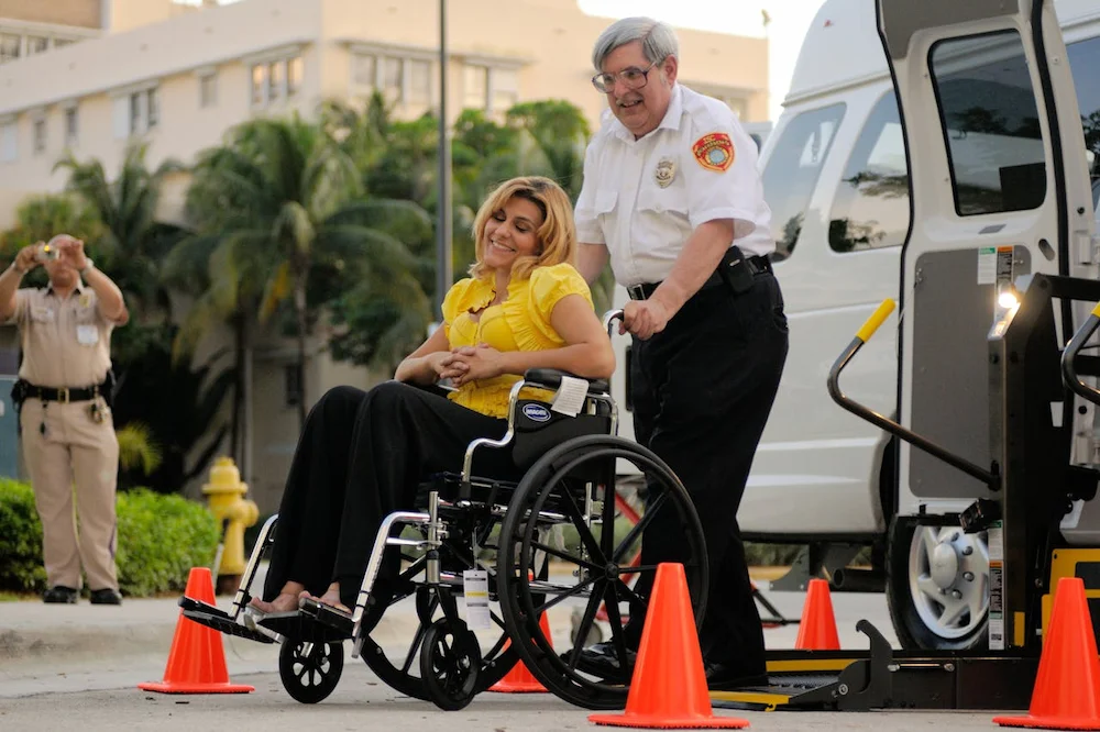 Wheelchair user traveling on ADA compliant walkway