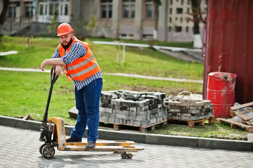 Workers installing concrete patio with precise leveling and finishing for durable outdoor surface